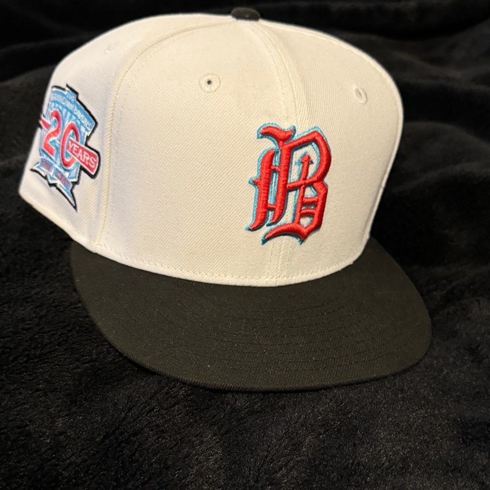 New Era White and Black Hat with Red and Blue Logo size 7 3/8
